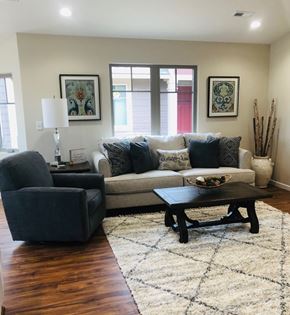Dodge City apartment for rent - A living room with a couch, chair, and coffee table.