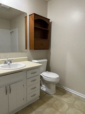 Snyder house for rent - a bathroom with a toilet and a sink