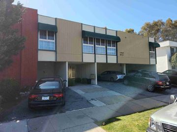 Playa Del Rey apartment for rent - a view of the front of a building with cars parked outside