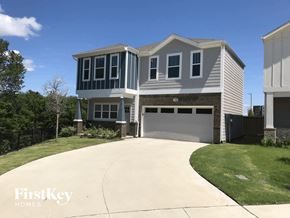 Lewisville house for rent - a large house with a driveway in front of it