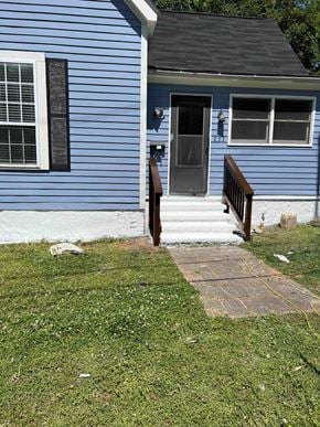 Rock Hill house for rent - a blue house with a porch and a backdoor