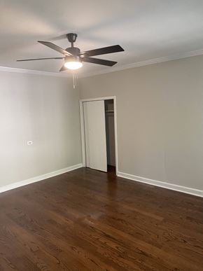 Rock Hill house for rent - a living room with wood floors and a ceiling fan