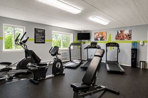 Camp Hill apartment for rent - A gym with treadmills, elliptical machines, and exercise bikes.