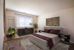 Glen Burnie apartment for rent - a bedroom with a bed and a couch