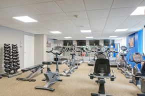 Plymouth Meeting apartment for rent - a gym full of exercise equipment in a building