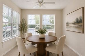 Stafford apartment for rent - A dining room with a round table and chairs.
