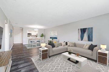 Omaha apartment for rent - a living room with a couch and a table