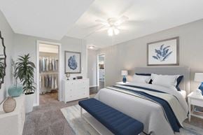 Omaha apartment for rent - a bedroom with a bed and a closet