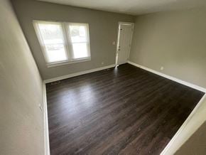 Louisville apartment for rent - A room with a wooden floor and a window.
