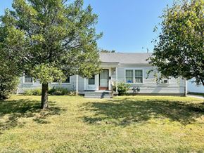 Louisville apartment for rent - A house with a tree in front of it.