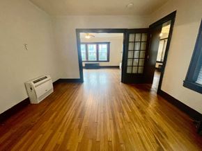 Louisville apartment for rent - an empty living room with a hard wood floor and