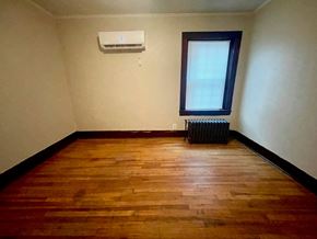Louisville apartment for rent - an empty room with wooden floors and a window