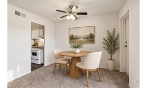 Philadelphia townhouse for rent - A dining room with a round table and chairs.