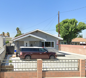 Cudahy apartment for rent - A brown car is parked in front of a house.