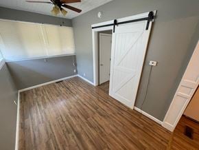 Jeffersonville apartment for rent - an empty living room with a sliding door to a bedroom
