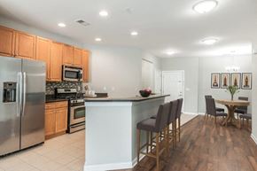 Cranford apartment for rent - a kitchen with a counter top and a refrigerator