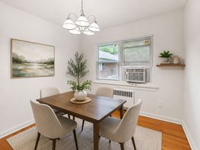 Westfield apartment for rent - A dining room with a wooden table and chairs.