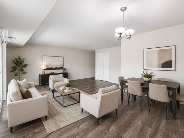 Blackwood apartment for rent - A modern living room with a large couch, a coffee table, and a dining table set up.