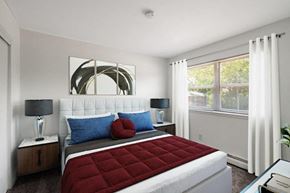 Long Branch apartment for rent - a bedroom with a bed and a window