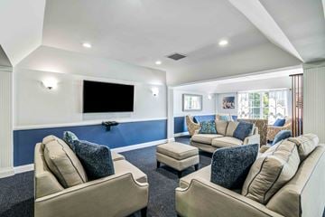 Franklin Lakes apartment for rent - a living room with couches and chairs and a tv