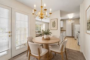 Franklin Lakes apartment for rent - A dining room with a round table and chairs.