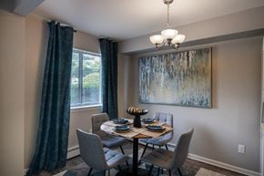 Middletown apartment for rent - a dining room with a table and chairs