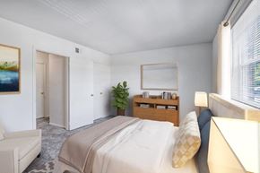 Wilmington apartment for rent - a bedroom with a bed and a couch