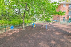 Mt. Arlington apartment for rent - a dog park with trees and a fence