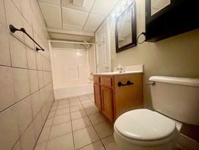 Louisville house for rent - a bathroom with a toilet and a sink