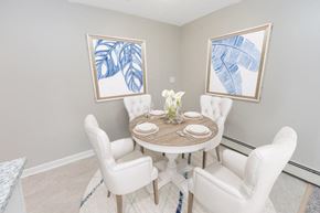 Long Branch apartment for rent - a dining room with a table and chairs