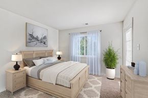 Pleasantville apartment for rent - a bedroom with a bed and a window