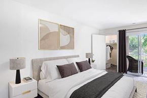 Clementon apartment for rent - a bedroom with a large bed and a window