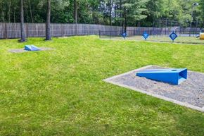Clementon apartment for rent - two blue trampolines on the grass in a park