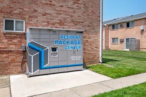 Somerdale apartment for rent - a small parking meter in front of a brick building