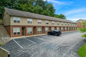 New Albany apartment for rent - a building with a car parked in front of it