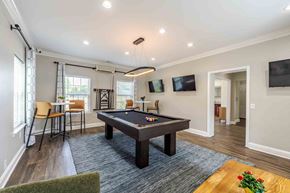 King Of Prussia apartment for rent - A room with a pool table and a television mounted on the wall.