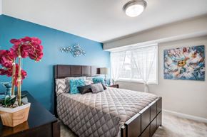 Randallstown apartment for rent - a bedroom with a bed and a window