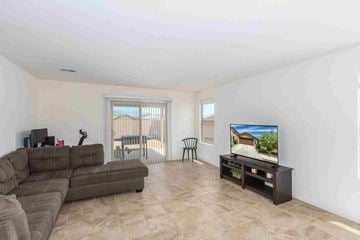 Tucson house for rent - a living room with a couch and a tv