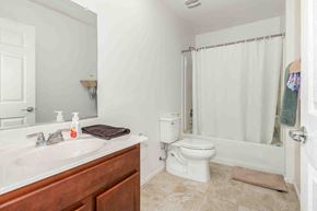 Tucson house for rent - a bathroom with a sink toilet and a shower