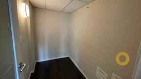 Vancouver house for rent - A hallway with a yellow circle on the wall.