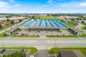 Clarksville apartment for rent - an aerial view of a large building with blue roofs