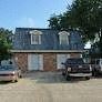 Metairie apartment for rent - a house with a blue roof and a truck parked in front of it
