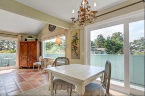 Aptos apartment for rent - dining hall with white tables and chairs