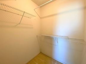 Merced house for rent - a empty closet with an empty shelf in it