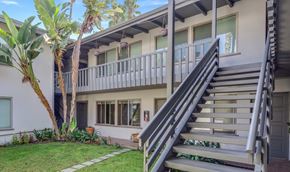 Los Angeles apartment for rent - A house with a staircase leading to the second floor.