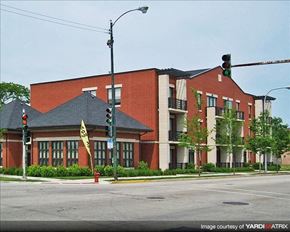 Chicago apartment for rent - a red brick building on the corner of a street