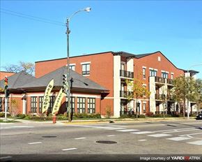 Chicago apartment for rent - a large brick building on the corner of a street
