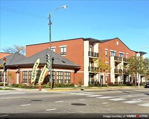 Chicago apartment for rent - a large brick building on the corner of a street