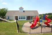 Mountville apartment for rent - a childrens play area in front of a house