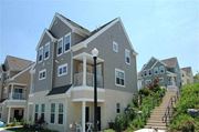 Mountville apartment for rent - a row of houses with stairs and a street light